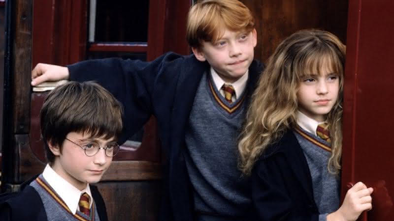 Daniel Radcliffe, Emma Watson e Rupert Grint em "Harry Potter e a Pedra Filosofal" - (Divulgação/Warner Bros.)