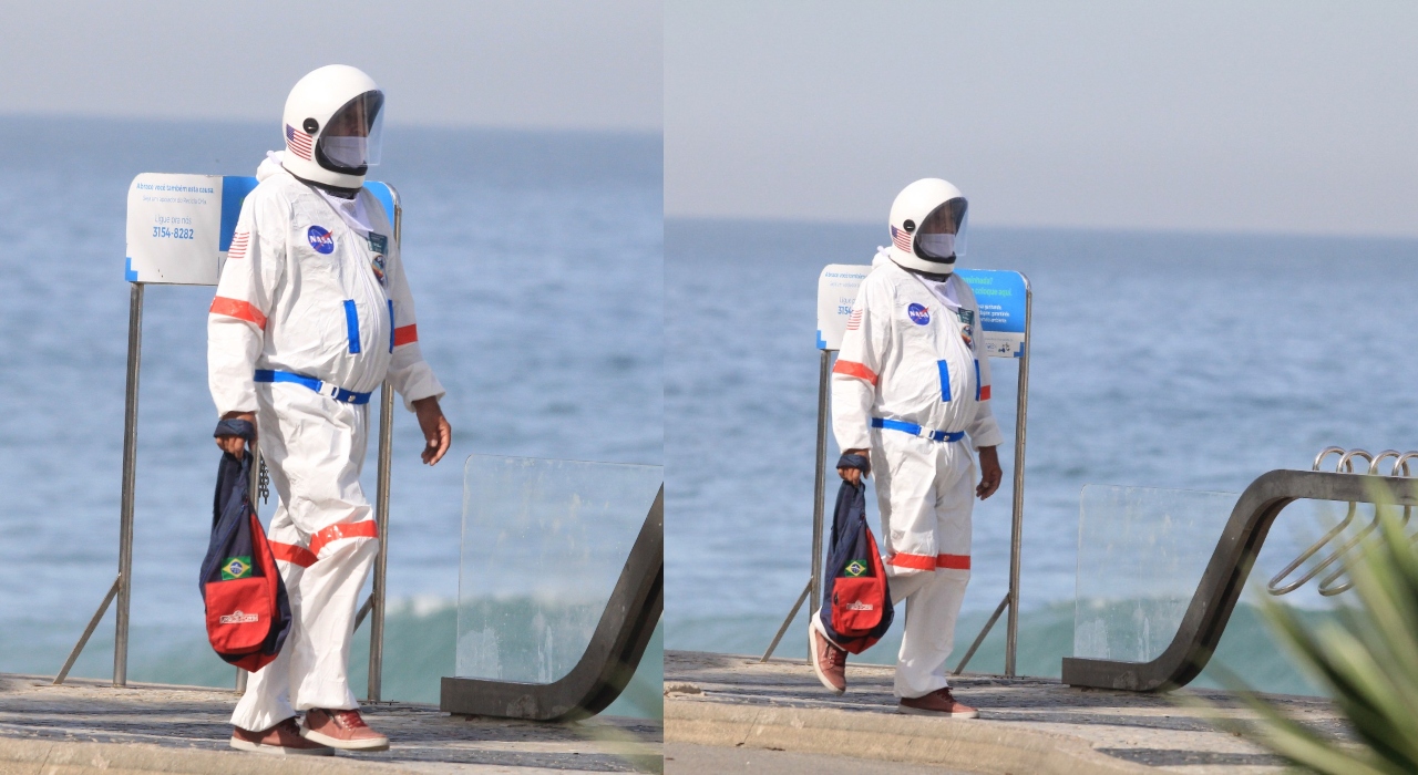 Homem vestido de astronauta é flagrado caminhando na orla da praia de Ipanema; veja