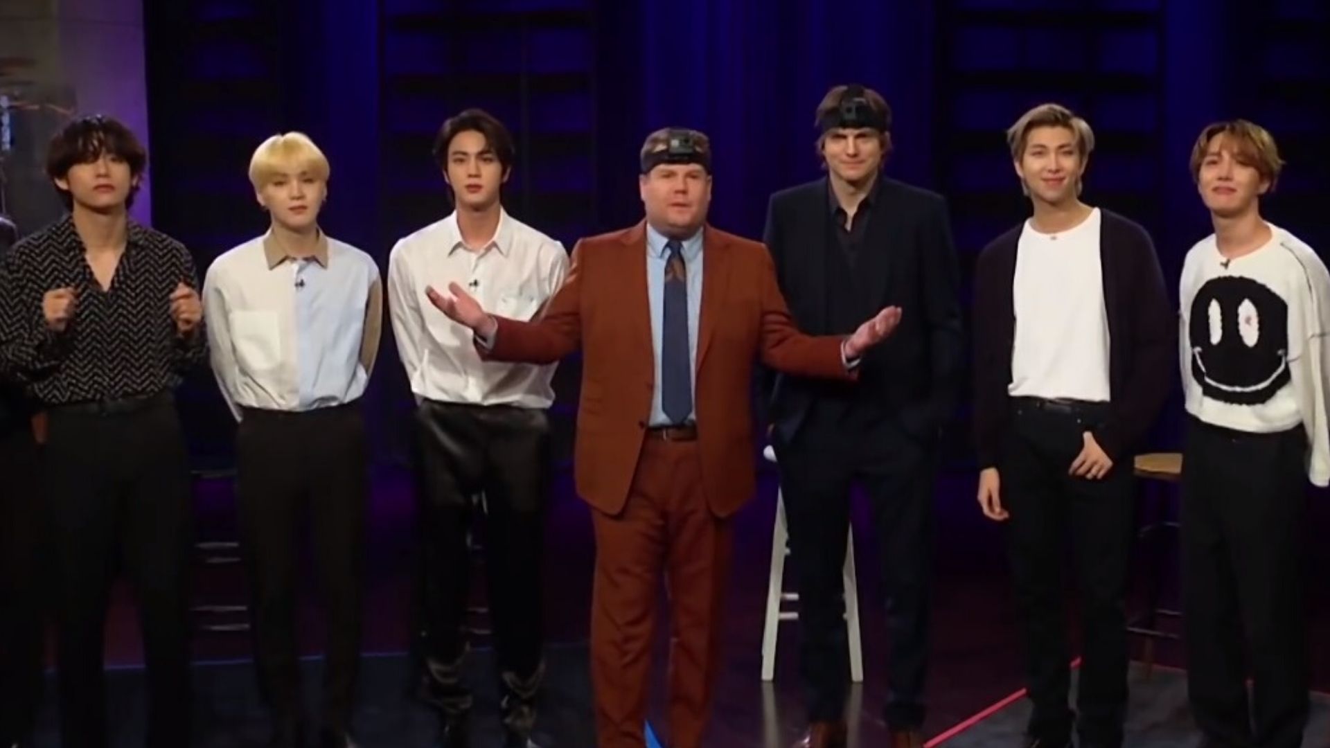 BTS brinca de esconde-esconde com James Corden e Ashton Kutcher; assista